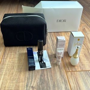Christian Dior Black Canvas Cosmetic Pouch with three travel size gifts